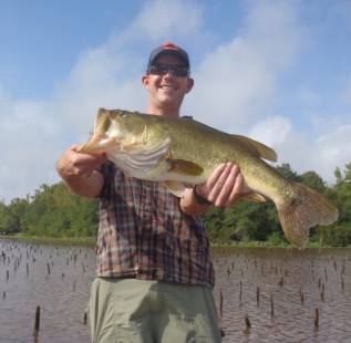 Andrew Fitzhugh holds the biggest bass of his life, to date. A 9 pounder caught on a buzz bait in early September at Oakwood Lake Leon.