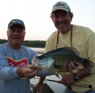 Member, David Owens (right), and guest hold a huge 3lb+ crappie caught at San Saba Waco Creek. One of the largest crappie ever reported on club waters.